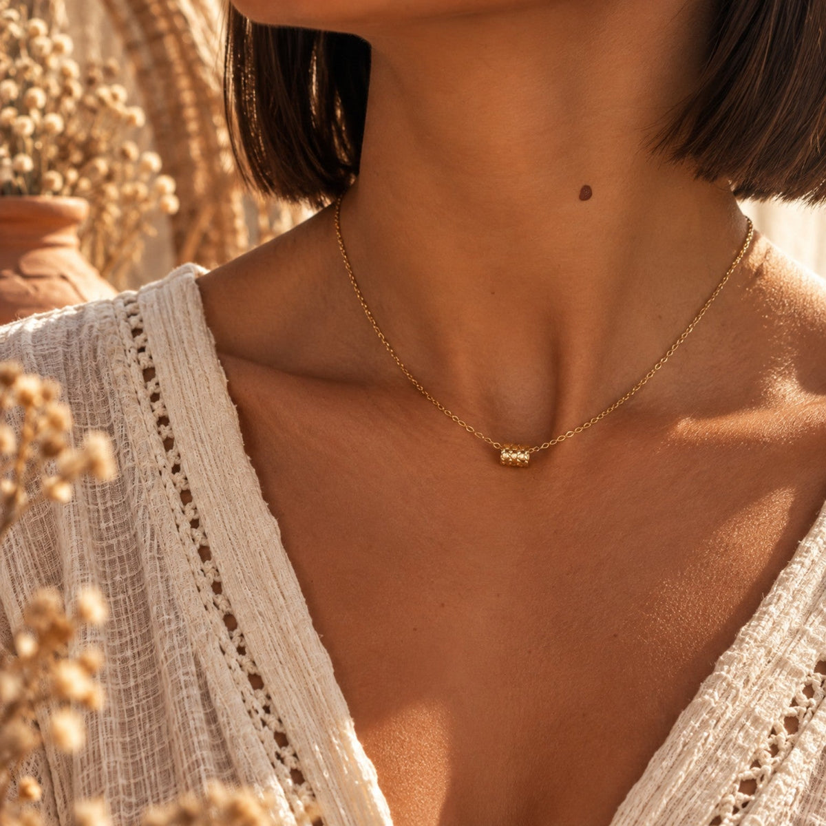 Collier ANTALYA doré à motif central porté